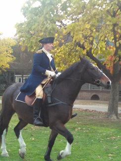 George Washington astride one of his horses.